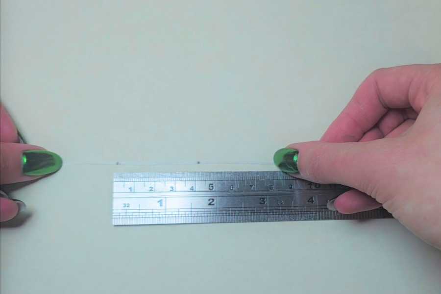 Demonstration of measuring fingers for finger claws for adult hands