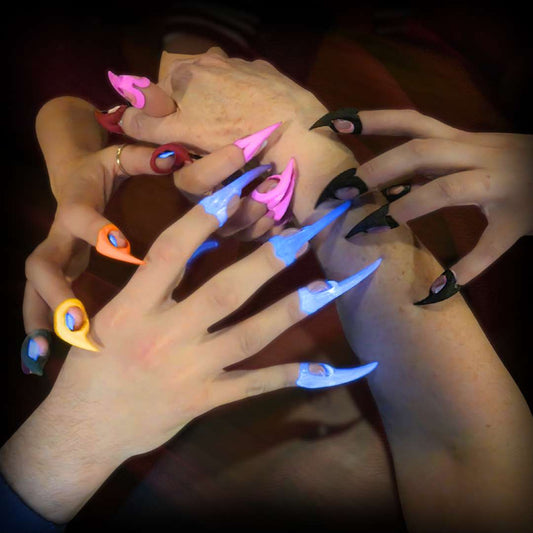 Close-up of hands with Kitten and Wolfcat Claws for sensual adult play