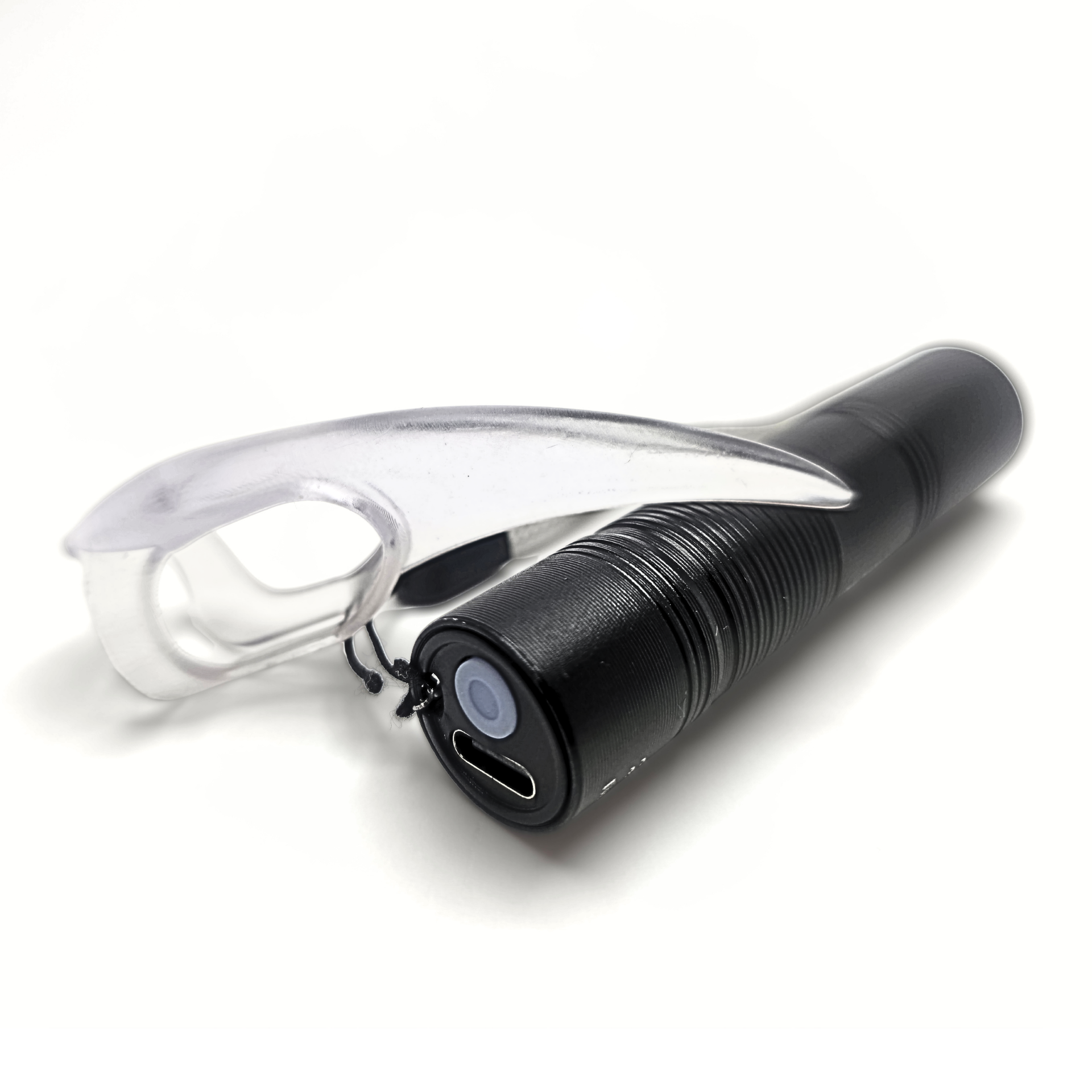 UV Torch for kink play shown with UV reactive BDSM Claw for scale. USB charging