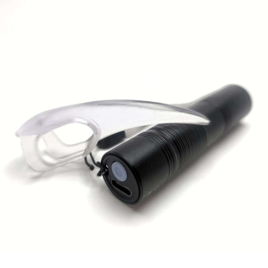 UV Torch for kink play shown with UV reactive BDSM Claw for scale.