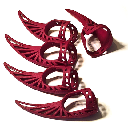 Full set of five red Steampunk Nylon Claws laid out together